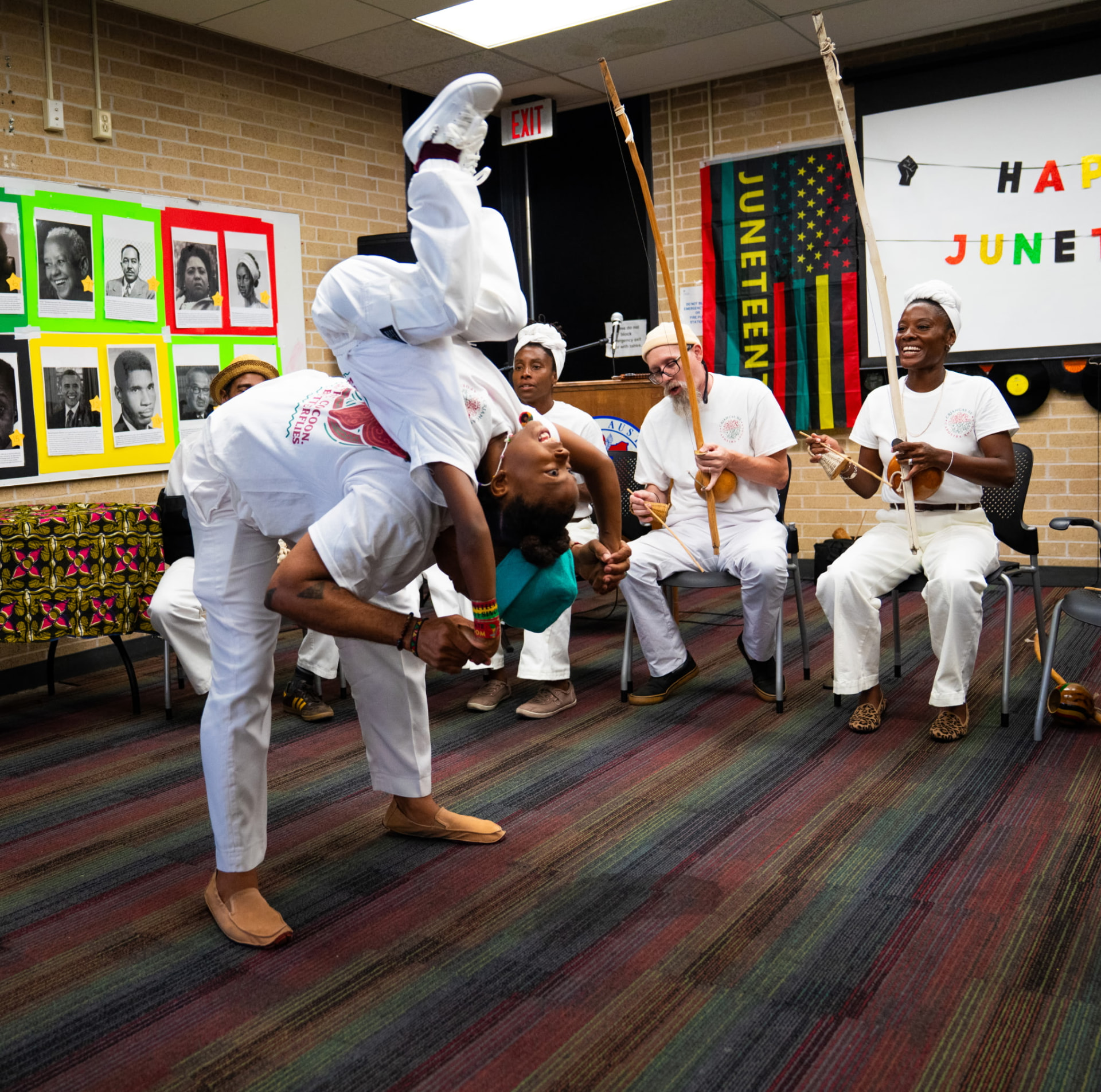 Capoeira Angola performance with berimbau music at a Juneteenth celebration
